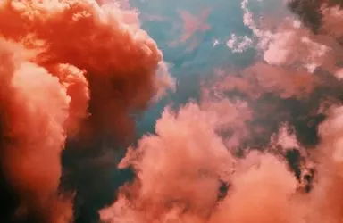 An ethereal blend of clouds and sunlight as dusk approaches. Laura Vinck/Unsplash